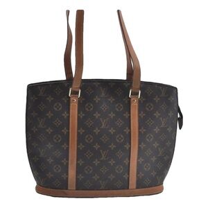 Lou’s Vuitton over size tote.  Great condition